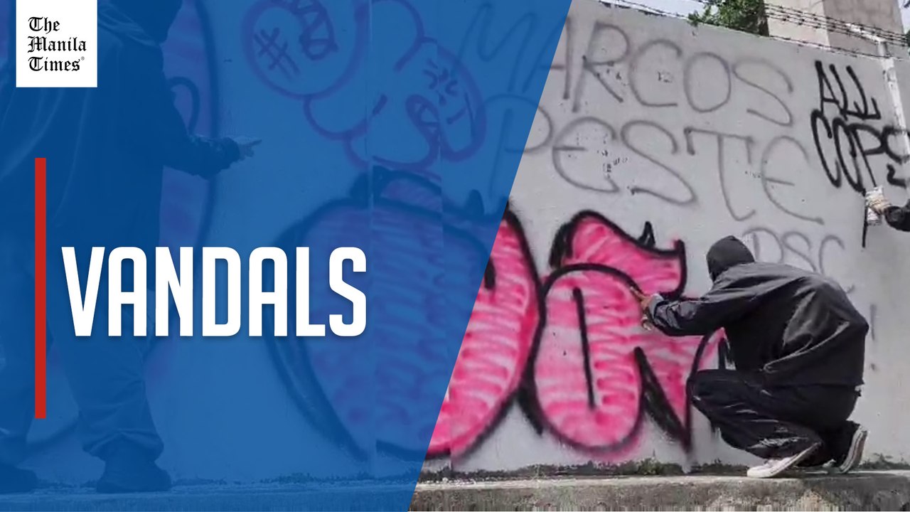 Protesters spray-paint graffiti ahead of Marcos SONA
