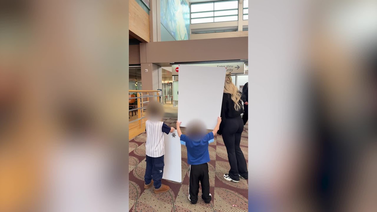 Soldier Returns Home After  Deployment for Emotional Airport Reunion