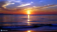 水平線に沈みつつある真っ赤な夕日