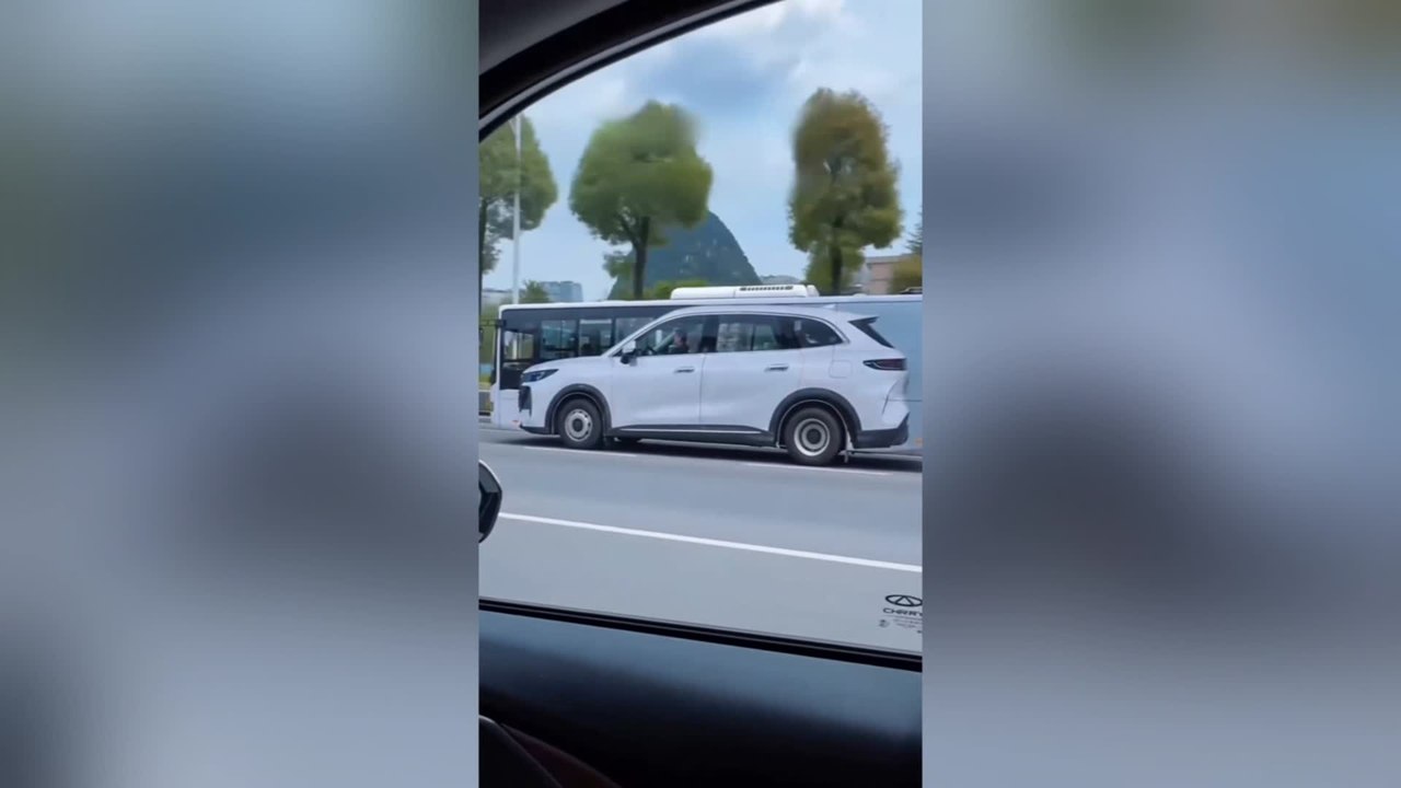 Bus Advertisement Makes It Look Like Man Is Driving Car