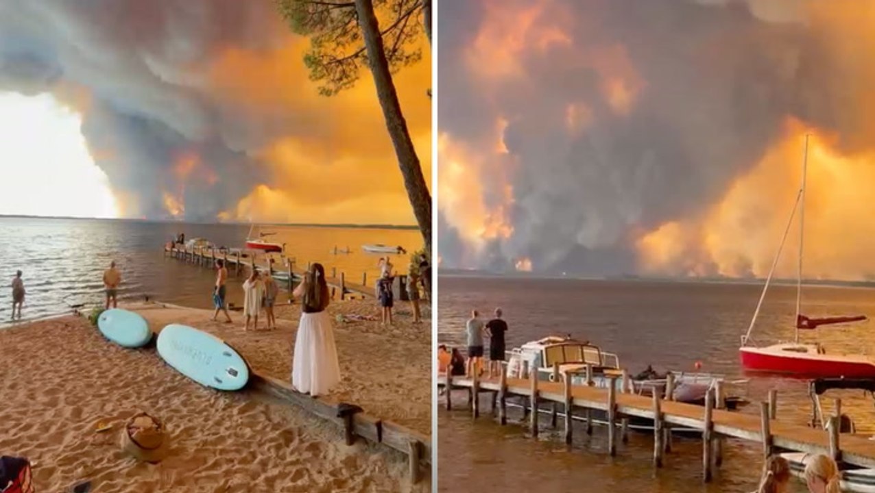 France wildfires turn skies apocalyptic orange as beachgoers watch on