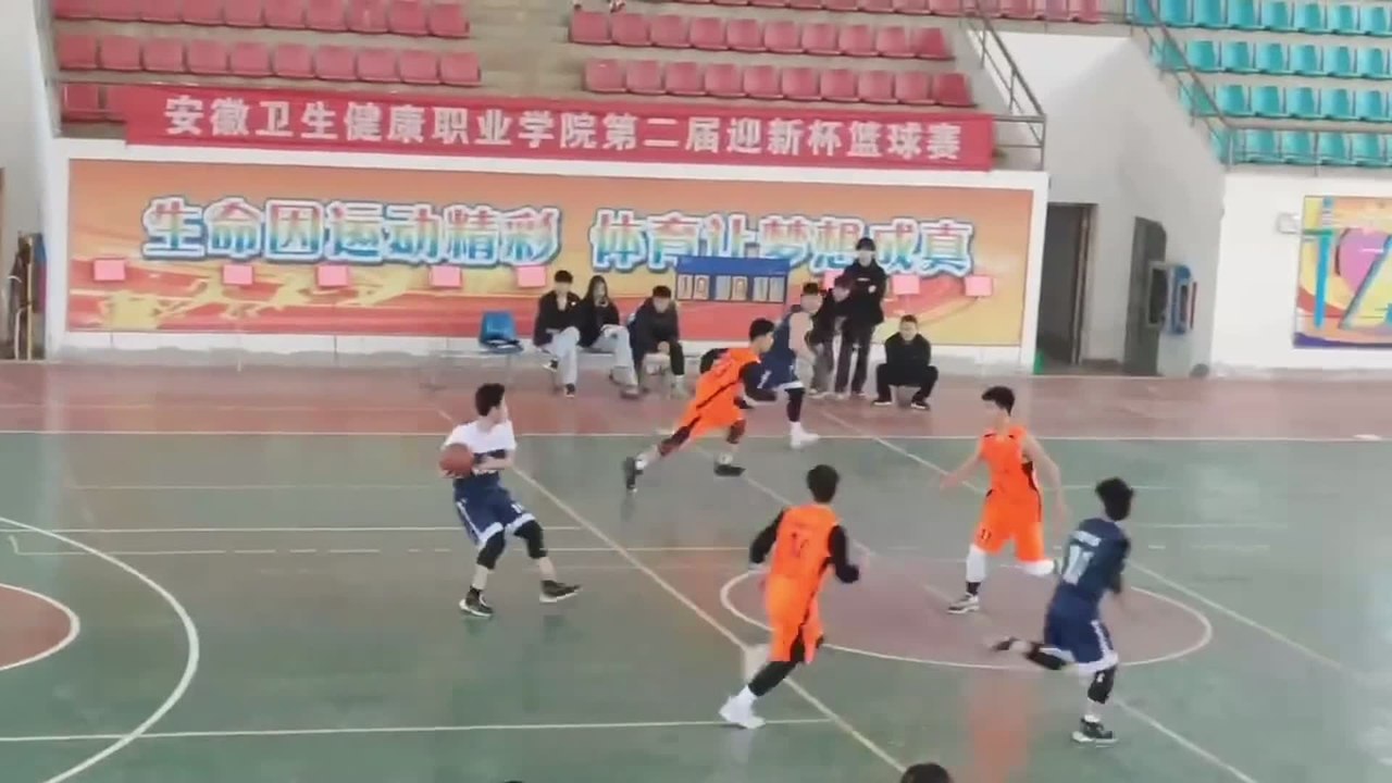 Basketball Player Crashes Through Courtside Door