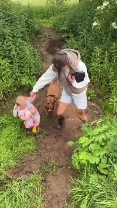 Woman Falls Into Mud With Toddler
