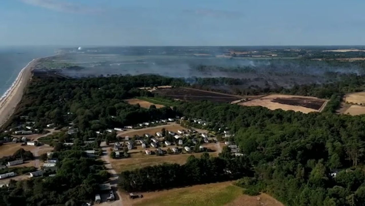 Suffolk wildfire drone video shows how close blaze came to holiday park