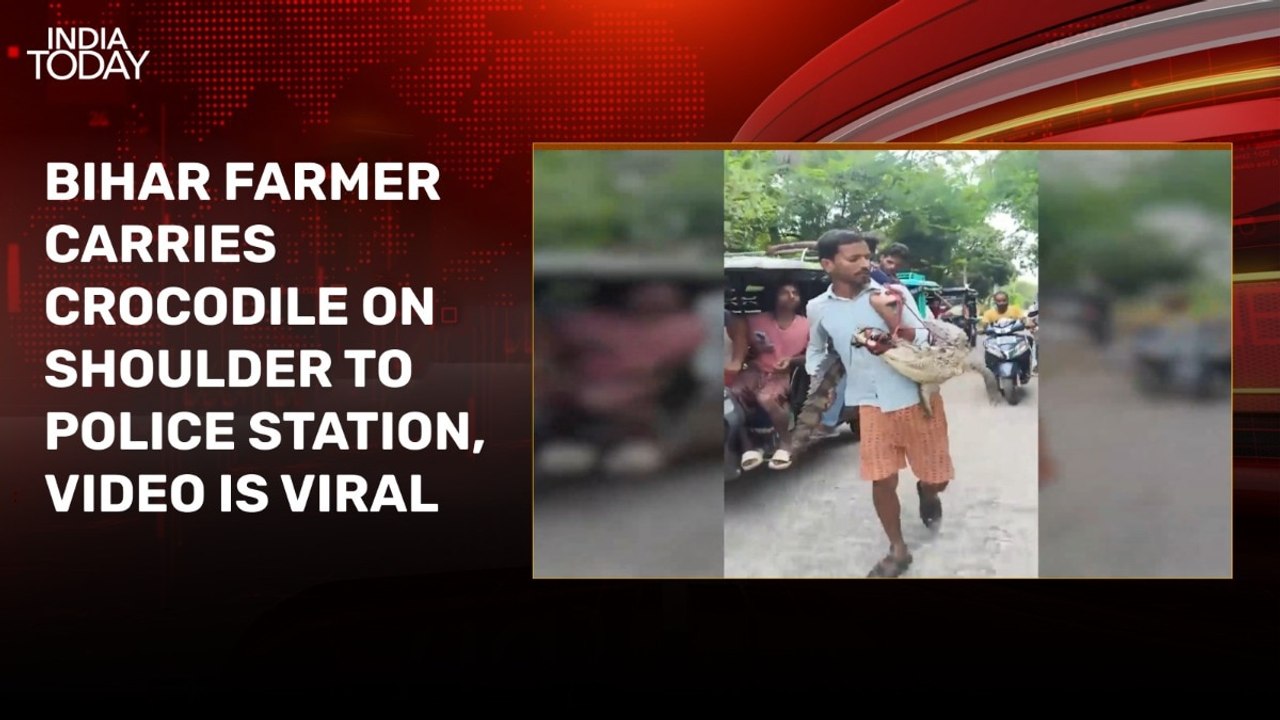 Video: Bihar farmer carries live crocodile on his shoulder to police station