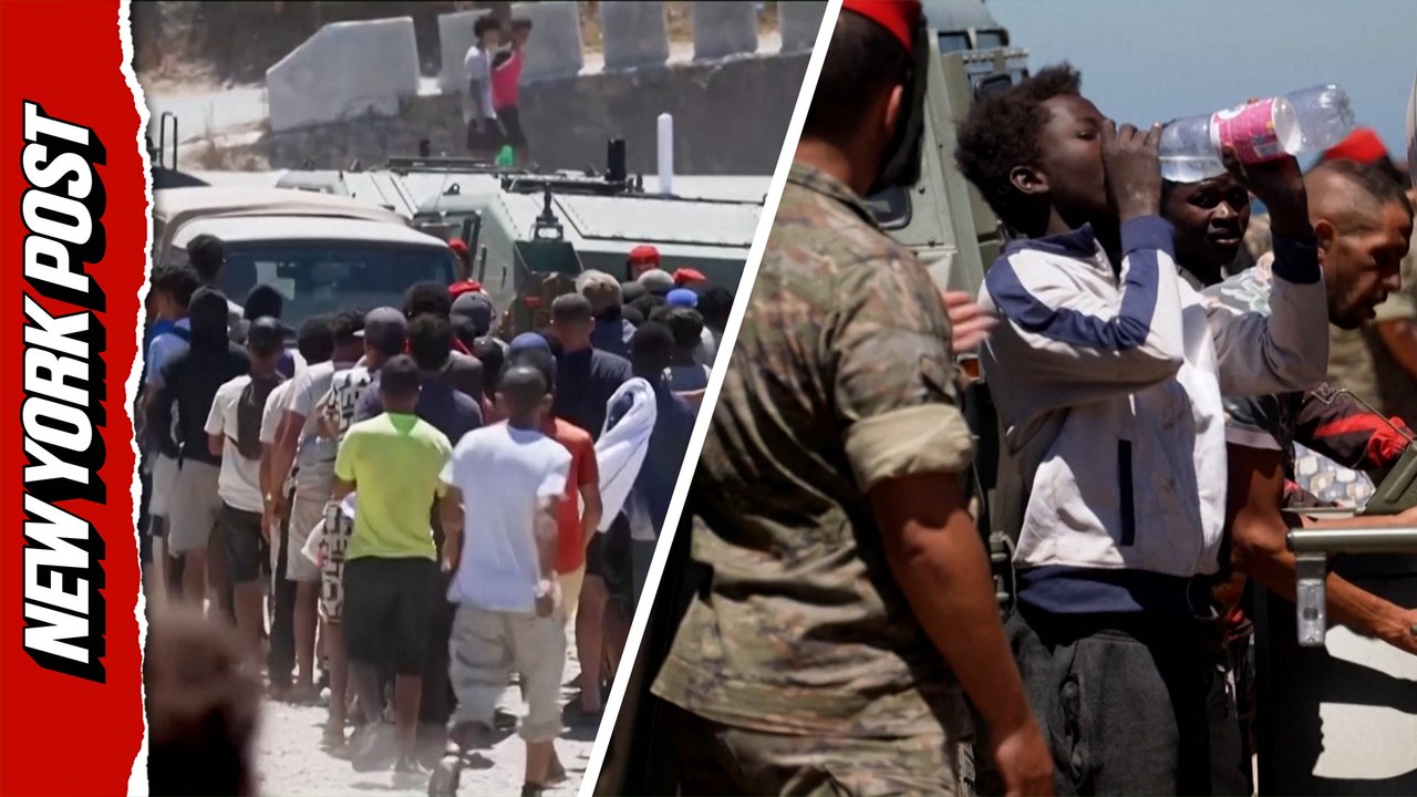 Desperate migrants pack Spanish army water distribution point
