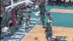 NBA BASKETBALL - Baron Davis dunks on Kevin Garnett