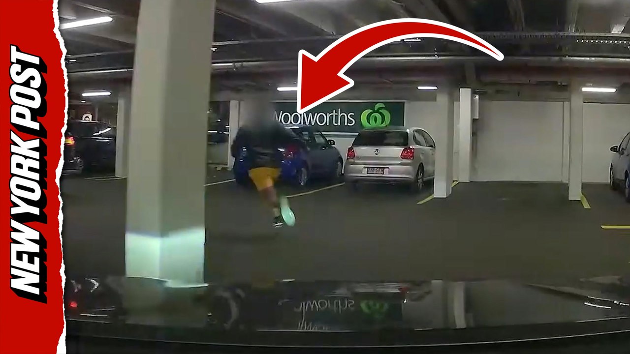 Dashcam captures dramatic moment officer weaves through parking lot to catch suspect