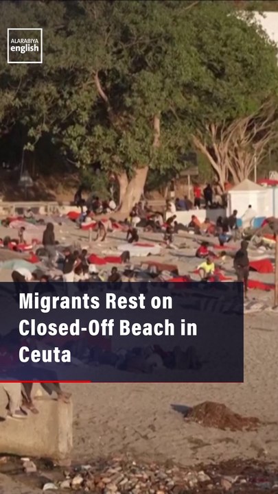 Migrants Rest on Closed-Off Beach in Ceuta