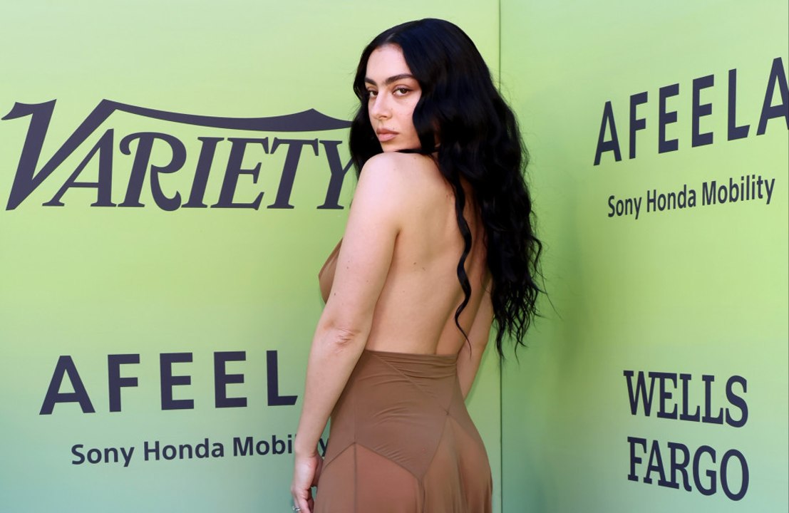 Charli xcx insists not all of her music is her being 'ironic' as she reflects on the meaning of Rock Music