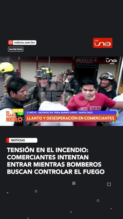 Tensión en el incendio: comerciantes intentan entrar mientras bomberos buscan controlar el fuego