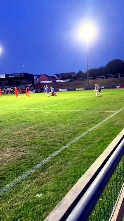 Jack Baxter chips in Buckland's ninth goal of the evening