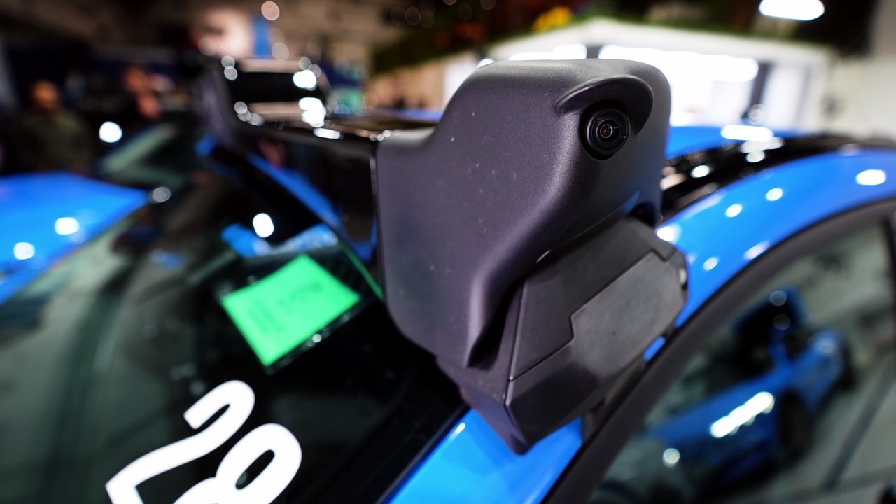 Driverless taxis to launch - but with a driver behind the wheel