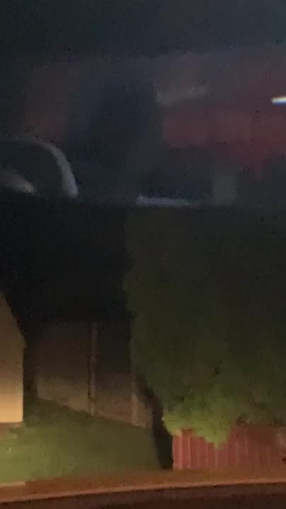 Driver Spots Hooded Spirit Sitting in Truck Through Rear View Mirror