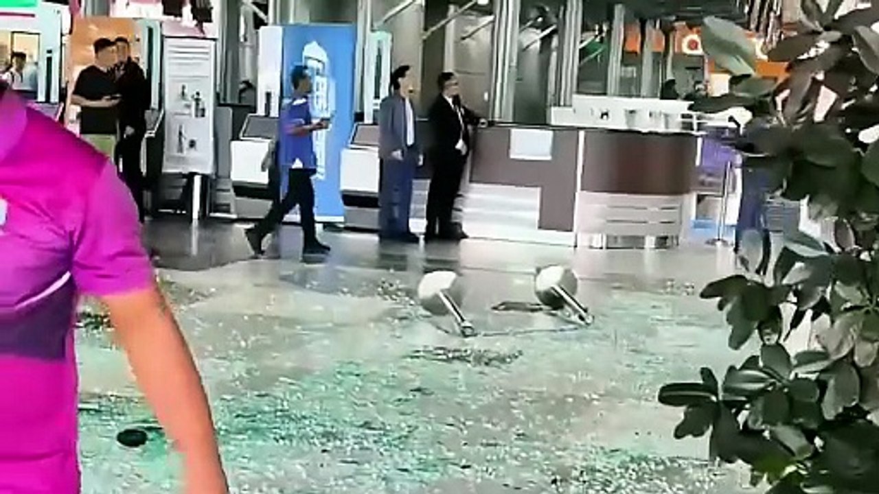 Woman injured after SUV crashes into KKIA departure hall entrance