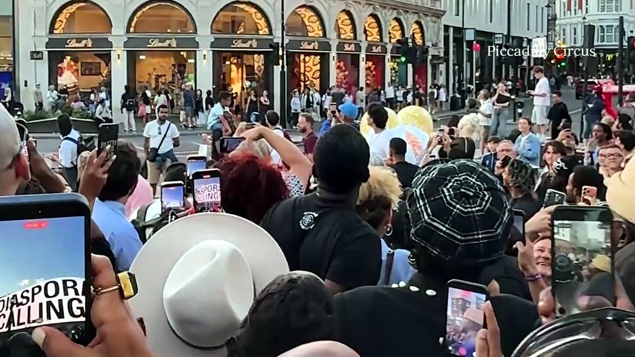 Fugees reunite for surprise performance of 'Ready or Not' in Piccadilly Circus