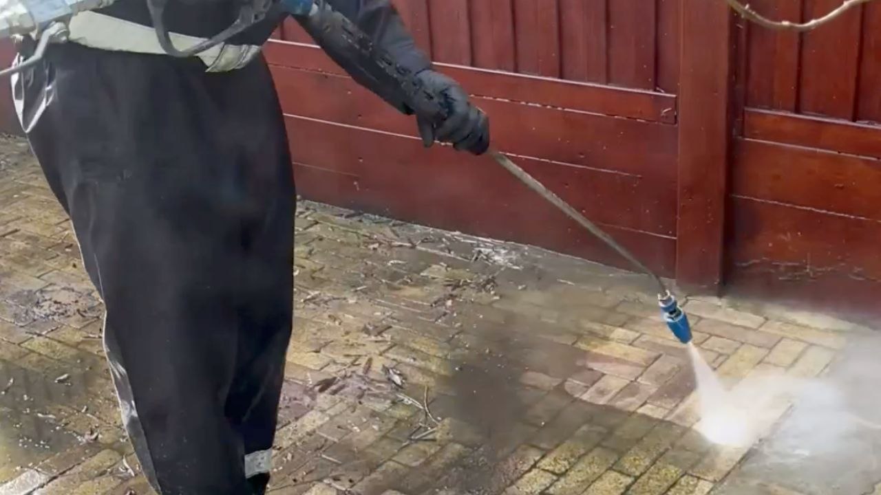 Grime Gives Way Under A Steady Pressure Wash