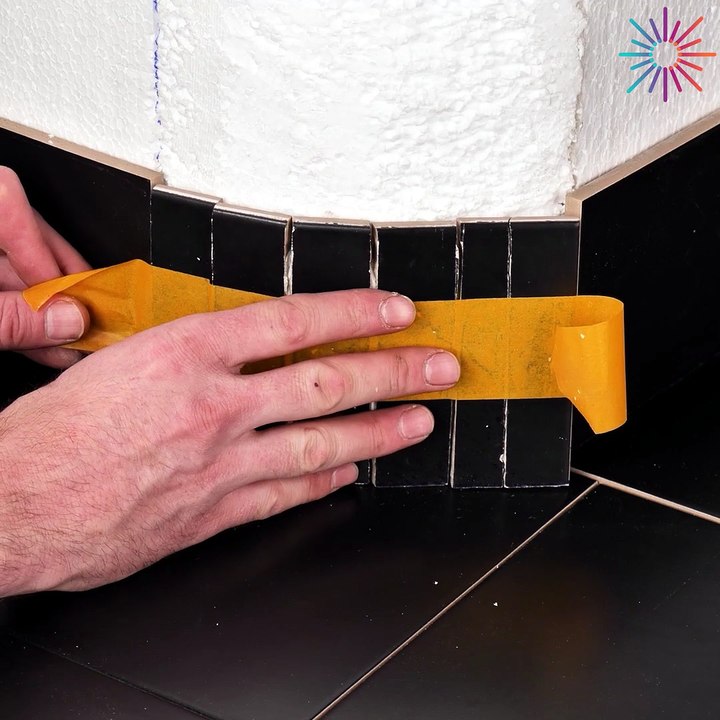 Trimming tiles for a curved wall!
