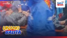 Rider na sumilong sa kasagsagan ng ulan, patay matapos mabagsakan ng halaman at 2 poste | Unang Balita