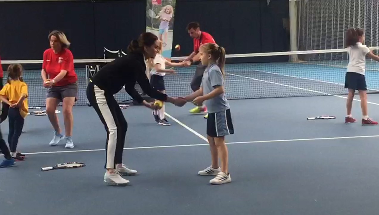 Duchess Kate plays tennis with children