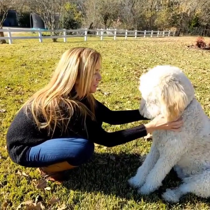 Monica Aldama shows how well-trained her dog is