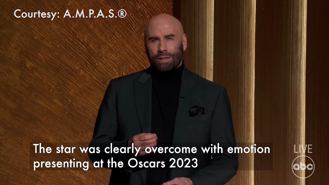 John Travolta overcome with emotion during the 2023 Oscars