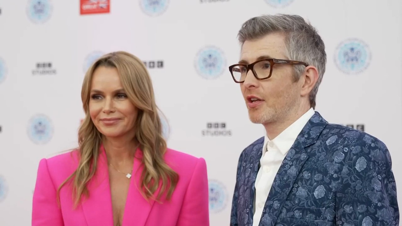 Amanda Holden wows in plunging pink suit on red...