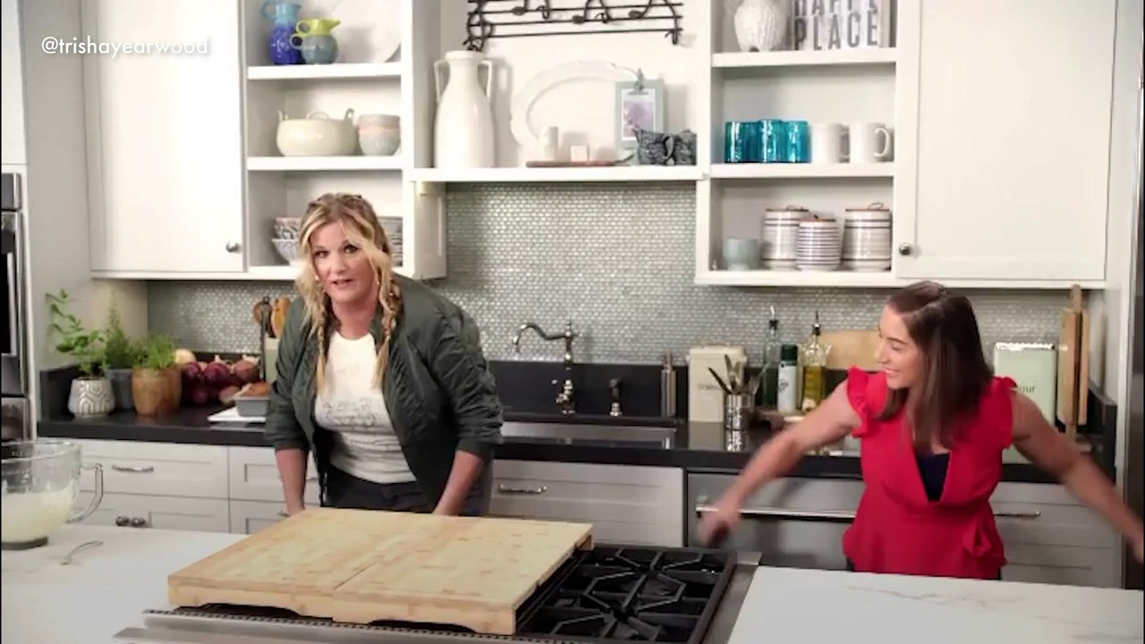 Trisha Yearwood uses kitchen utensils to work out