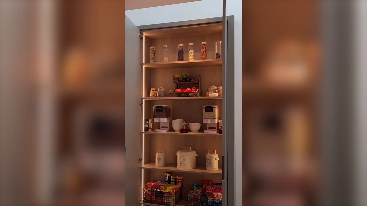 Zara McDermott opens doors to dream pantry at p...