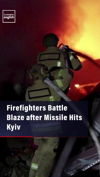 Firefighters Battle Blaze after Missile Hits Kyiv