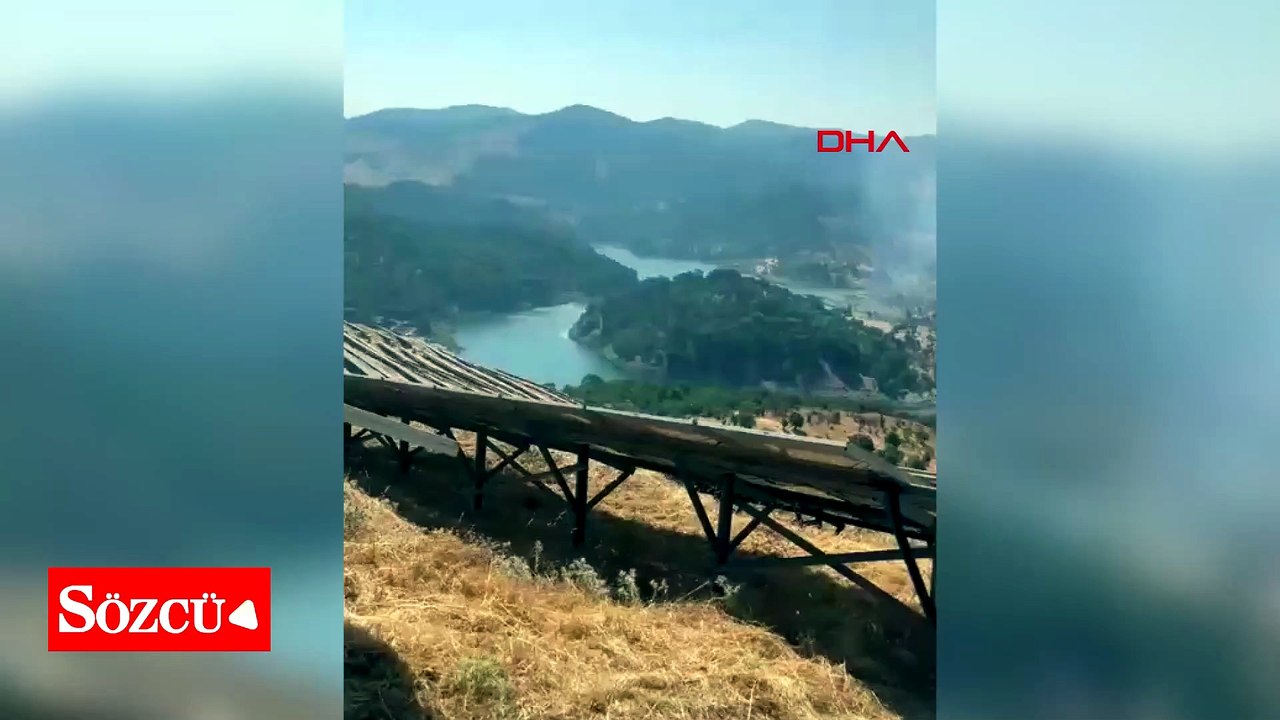 Balıkesir'de ormana sıçrayan yangın 1,5 saatte söndürüldü