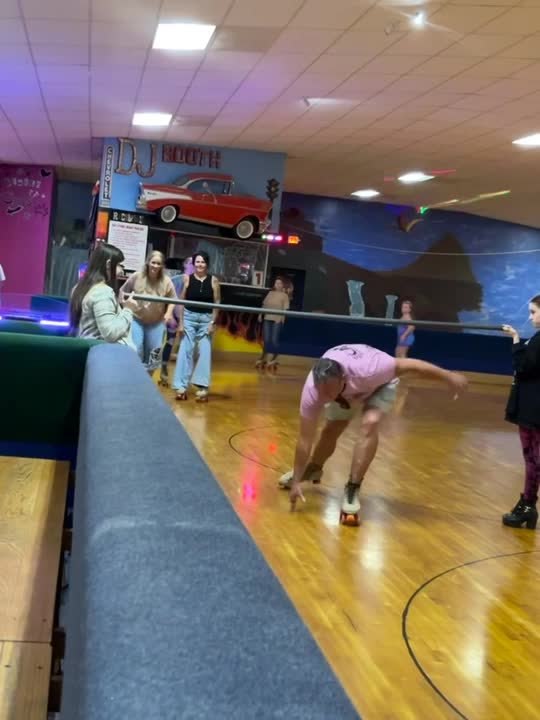 Man Falls While Attempting Trick During Roller-Skating Limbo