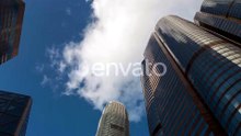 Skyscrapers Reach Towards Blue Sky in Modern Cityscape