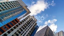 Low-Angle View of Skyscrapers Against Blue Sky