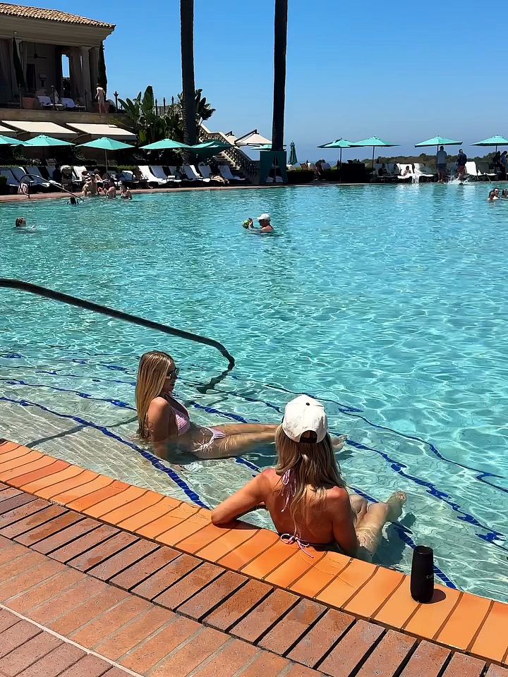 Christina Haack relaxes in pool while twinning with teen daughter