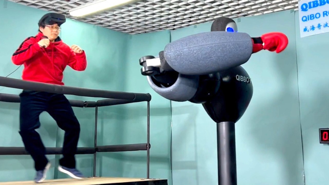 Qibo's Massive Robo-Boxer: A 1-to-1 Human-Contr...