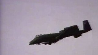 Military combat footage - a10 warthog fires at iraqi tanks