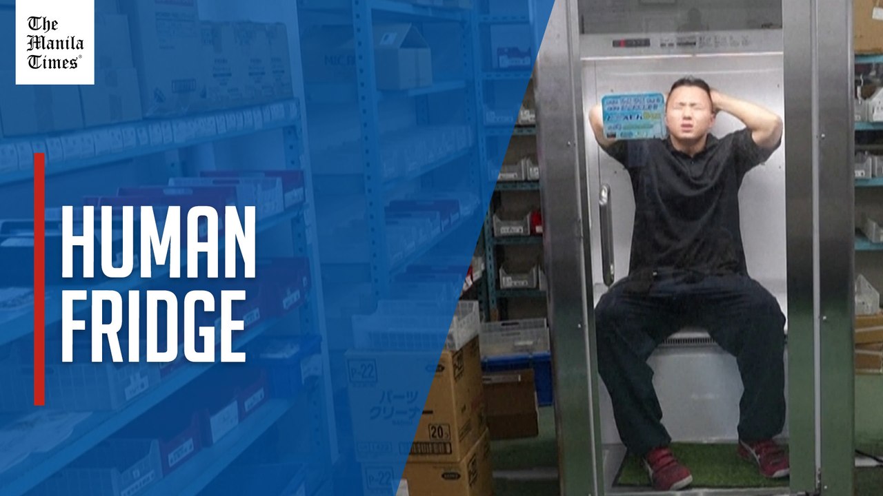 Human fridge helps workers cool off in Japan su...