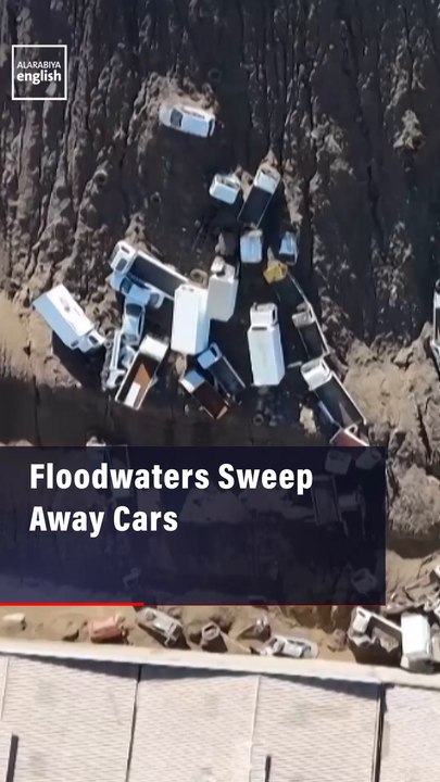 Floodwaters Sweep Away Cars