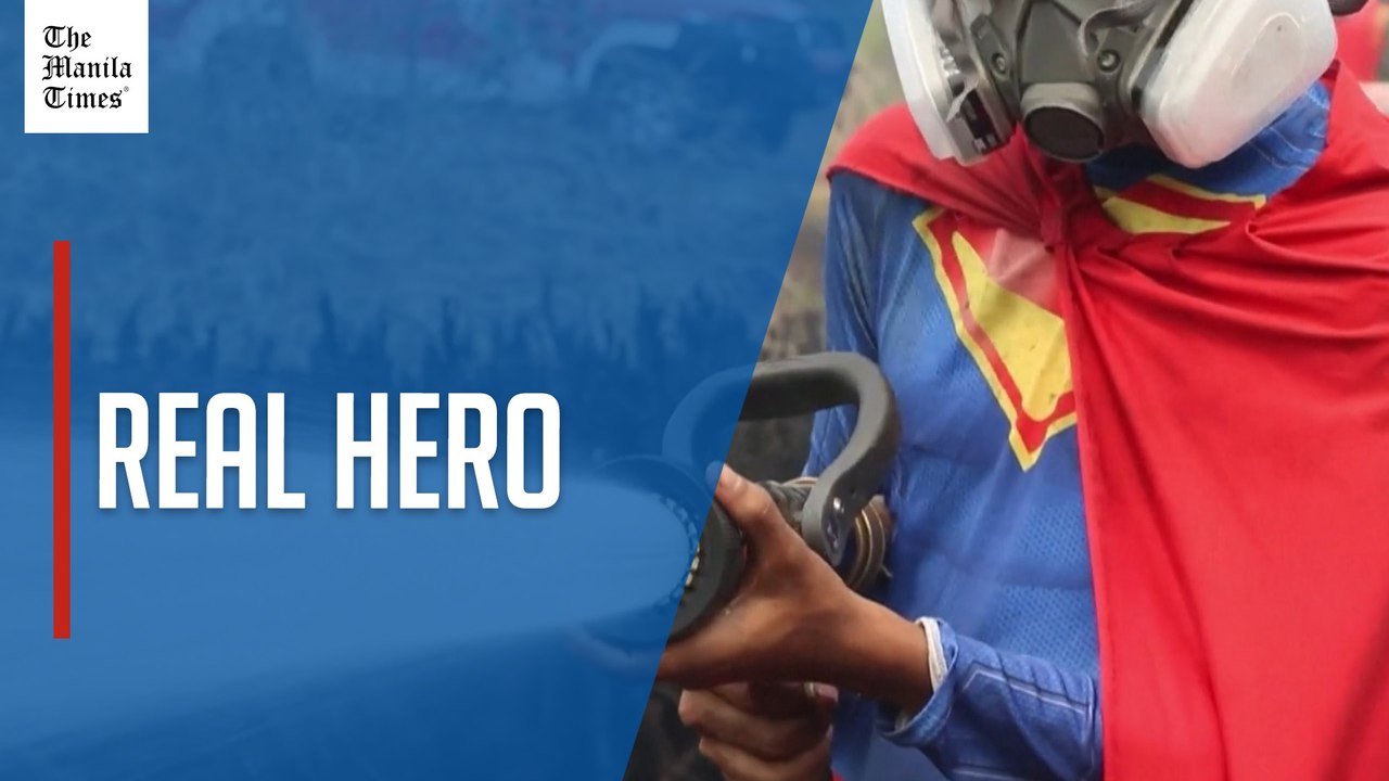 Teenager in superman costume joins wildfire fig...