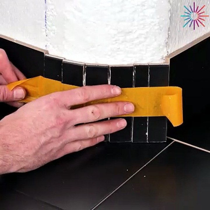 Trimming tiles for a curved wall!