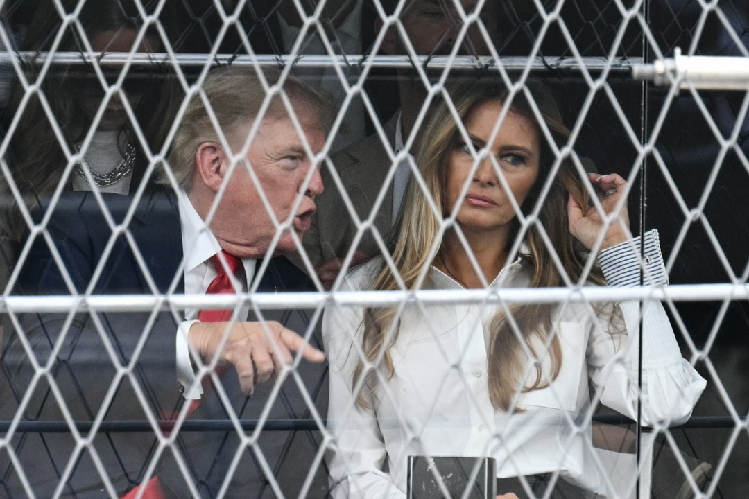What Donald Trump and Melania appeared to whisper during 'intense' VIP suite exchange