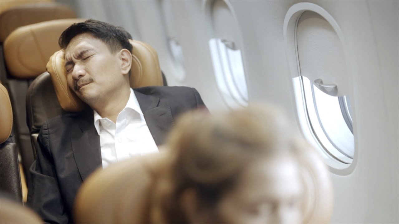 Sleep on a plane: expert tips you can actually use