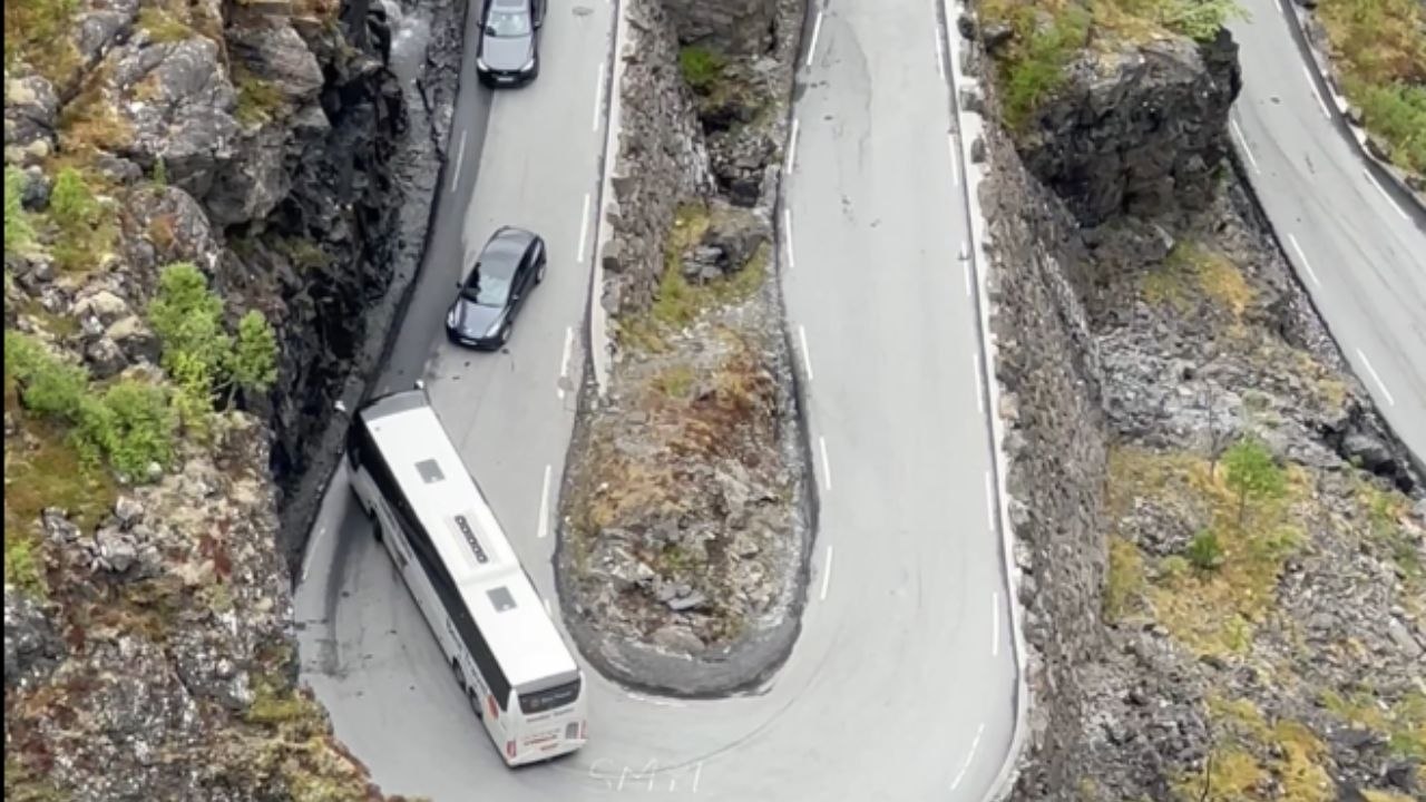 Bus Threads Its Way Through A Mountain Hairpin Road
