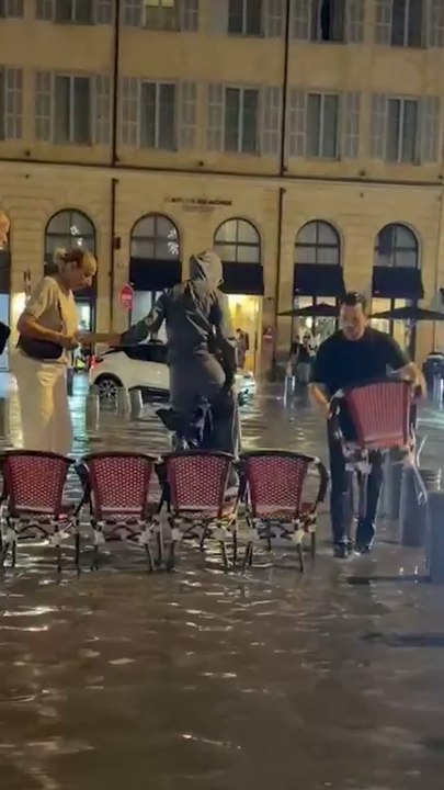 Creative Chair Bridge Helps People Cross Flooded Street