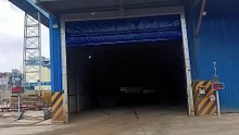 High-speed door vs sectional door: which improves warehouse efficiency more?