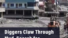 Diggers Claw Through Mud, Search for Survivors in Nepal