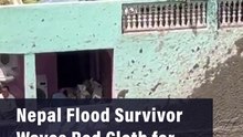 Nepal Flood Survivor Waves Red Cloth for Rescue From Rooftop