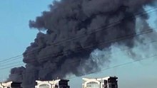 At least 37 killed after Russian strike sparks major fire and explosions at a warehouse in Bucha