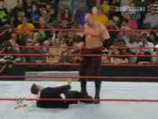 Kane attack Michael Cole and jerry king